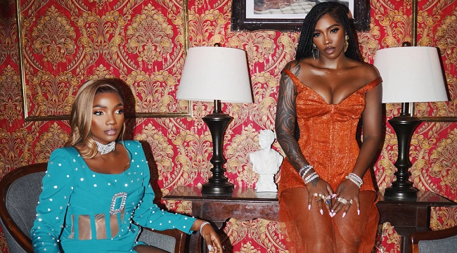 Simi and Tiwa Savage pose in a promotional photo